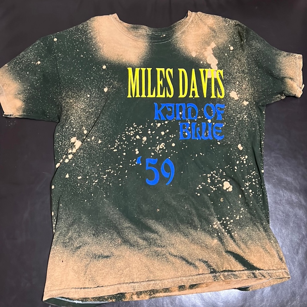 Miles Davis.  Kind of blue. Large